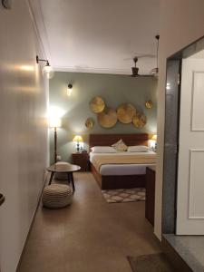 Ein Bett oder Betten in einem Zimmer der Unterkunft Elegant holiday homes Coorg