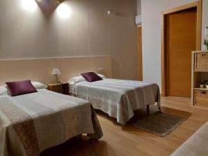 A bed or beds in a room at Ultreia
