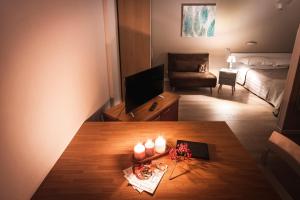 A television and/or entertainment centre at New Inn Residence