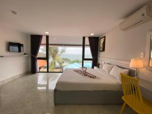 Postel nebo postele na pokoji v ubytování Vivian Hotel Mui Ne + 108 fotografií