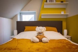 Postel nebo postele na pokoji v ubytování Huis van de Koekuit