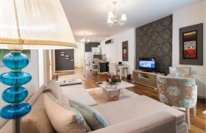 A television and/or entertainment centre at Turkuaz Suites Bosphorus