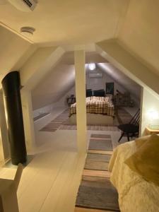 Ένα ή περισσότερα κρεβάτια σε δωμάτιο στο Guesthouse Kärsämäki