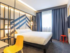 Ліжко або ліжка в номері ibis Styles Geneve Palexpo Aeroport