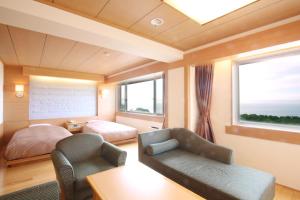 Cama ou camas em um quarto em Shiretoko Daiichi Hotel