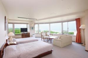 Cama ou camas em um quarto em Shiretoko Daiichi Hotel