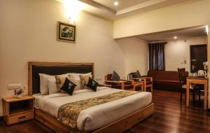 Letto o letti in una camera di Hotel SunGrace
