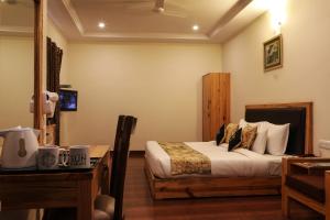Letto o letti in una camera di Hotel SunGrace