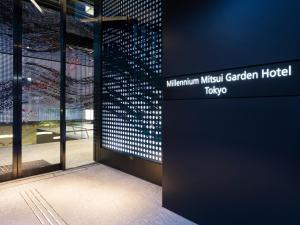 a building with a sign for the mittitt garden hotel at Millennium Mitsui Garden Hotel Tokyo in Tokyo