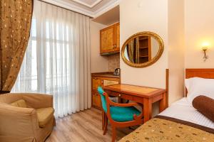 Postel nebo postele na pokoji v ubytování Santa Ottoman Hotel