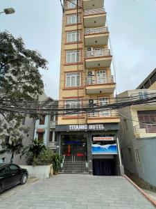 a building with a sign that reads turning hotel at TITANIC HOTEL in Hanoi