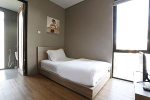 Ліжко або ліжка в номері M Suite