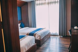 Krevet ili kreveti u jedinici u objektu Himalayan Suite Hotel