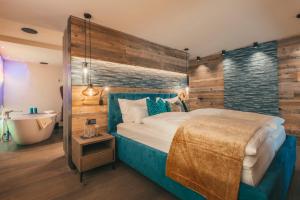 A bed or beds in a room at Chalet SALENA luxury lodge