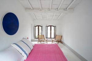 A bed or beds in a room at Finca El Azahar