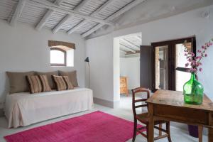 A bed or beds in a room at Finca El Azahar