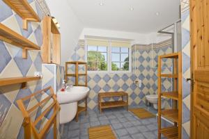 Ein Bett oder Betten in einem Zimmer der Unterkunft Ostseehaus Lea Doppelhaushälfte