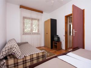 Giường trong phòng chung tại Apartment Bajan 545