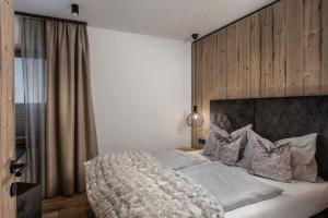 
Кровать или кровати в номере hager's apartments
