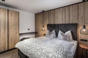 Postel nebo postele na pokoji v ubytování hager's apartments