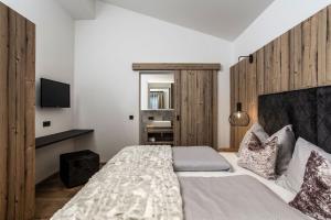 Postel nebo postele na pokoji v ubytování hager's apartments