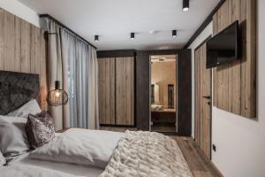 Postel nebo postele na pokoji v ubytování hager's apartments