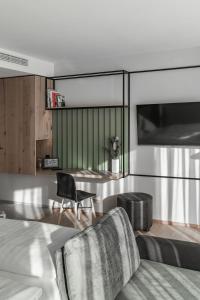TV in/ali zabaviščno središče v nastanitvi Stadthotel Goldenes Schiff