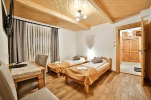 Posteľ alebo postele v izbe v ubytovaní Najlepszy Widok apartamenty