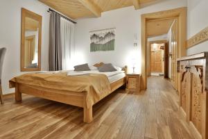 Posteľ alebo postele v izbe v ubytovaní Najlepszy Widok apartamenty