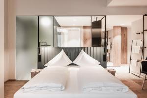 Postelja oz. postelje v sobi nastanitve Stadthotel Goldenes Schiff
