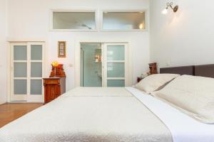 Postel nebo postele na pokoji v ubytování Apartments Placa Dubrovnik