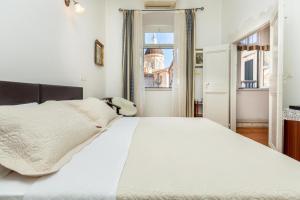 Postel nebo postele na pokoji v ubytování Apartments Placa Dubrovnik