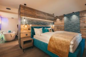 A bed or beds in a room at Chalet SALENA luxury lodge