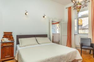 Postel nebo postele na pokoji v ubytování Apartments Placa Dubrovnik