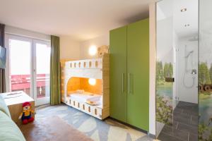 Posteľ alebo postele v izbe v ubytovaní Familotel Kaiserhof - Families only