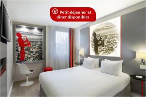 a hotel room with a bed and a sign that reads pet department at other departments at Best Western Paris Saint Quentin in Montigny-le-Bretonneux