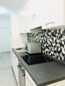 Kuchyň nebo kuchyňský kout v ubytování B&B Da Jana