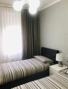 Postel nebo postele na pokoji v ubytování B&B Da Jana