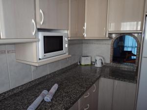 Kuchyňa alebo kuchynka v ubytovaní ACAPULCO PLAYA 26 MENYBER