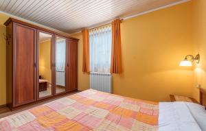 Postel nebo postele na pokoji v ubytování Holiday Home Fragola + 19 fotografií