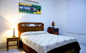 Hotel Chucarima 객실 침대