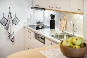 A cozinha ou cozinha compacta de Arbea Apartments Siëla