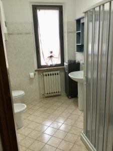 Phòng tắm tại Appartamento Turistico FRAU