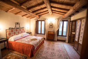 A bed or beds in a room at Casale la Meridiana