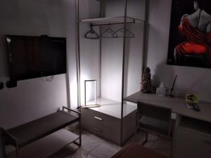 TV a/nebo společenská místnost v ubytování Rainbow Sweet Rooms