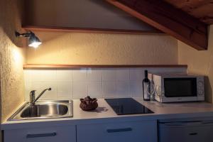 Eldhús eða eldhúskrókur á Rifugio Lilla