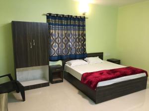 Postel nebo postele na pokoji v ubytování HAPPYSTAY rooms and cottages