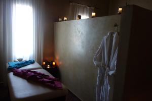 Boutique Hôtel palais Masandoia客房内的一张或多张床位