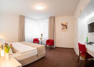TV a/nebo společenská místnost v ubytování Hotel Vila Viola