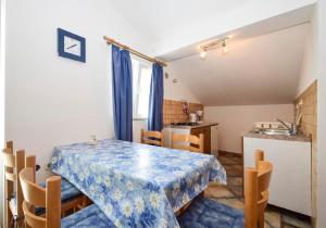 Kuchyň nebo kuchyňský kout v ubytování Apartments Silvana 597